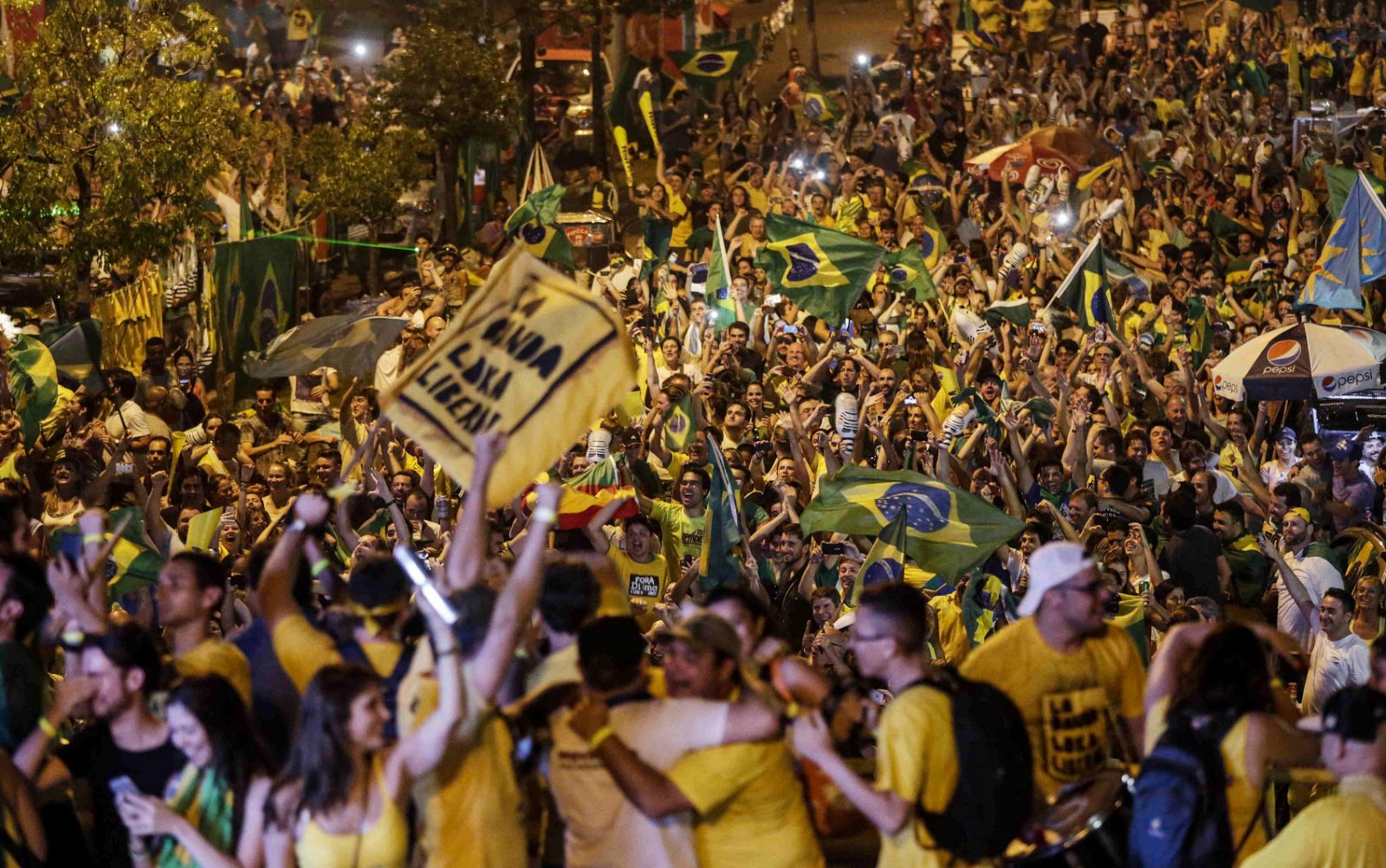 Opponents of President Dilma Rousseff celebrate after the impeachment vote in Porto Alegre